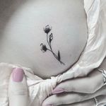 Small flowers made by Lindsay Phylo (IG—phylotattoos) #sidebook #boob #flowers #small #black #simple