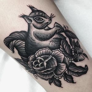Black and grey squirrel and flower tattoo by Cheyenne Gauthier. #traditional #blackandgrey #CheyenneGauthier #squirrel #flower
