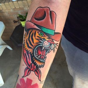 Cowboy tiger tattoo by Randy Conner. #traditional #RandyConner #tiger #cowboy #tattooflash #flashtattoo