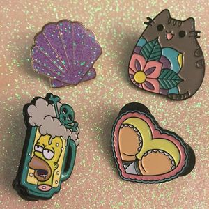 Shell, Pusheen, Homer Simpson, and butt enamel pins by Alex Strangler. #AlexStrangler #enamelpin #cute #girly #butt #heart #homersimpson #thesimpsons #shell #pusheen #pin