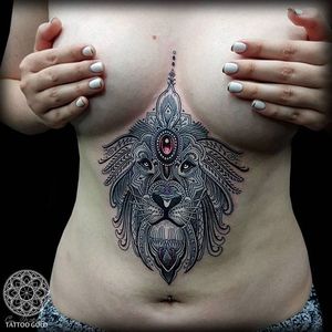 Sacred geometric underboob tattoo by Coen Mitchell. #CoenMitchell #sacredgeometric #sacredgeometry #underboob #lion #gem