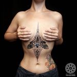 Sacred geometric underboob tattoo by Coen Mitchell. #CoenMitchell #sacredgeometric #sacredgeometry #underboob #butterfly #pointillism