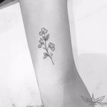 Tiny flower tattoo by Cholo #fineline #Cholo #blackandgrey #blackandgray #finelineblackandgrey #minimalistic #linework #small #flower