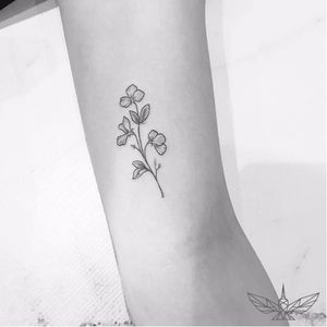 Tiny flower tattoo by Cholo #fineline #Cholo #blackandgrey #blackandgray #finelineblackandgrey #minimalistic #linework #small #flower