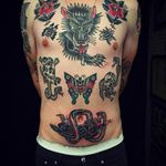 Beautifully composed front torso collection by Mark Cross. #MarkCross #rosetattooNYC #TraditionalTattoo #BoldTattoos #frontpiece