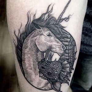 Beautiful delicate dotwork on the unicorn and dragon. Photo from Matina Marinou on Instagram #MatinaMarinou #blackworker #pointillism #dotwork #blackandgrey #woodcut #etching #engraving #dragon #unicorn
