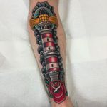 Lighthouse traditional tattoo by @jacobdoneytattoo #jacobdoneytattoo #traditional #traditionaltattoo #envisiontattoostudio #lighthouse