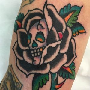 Black rose of death, I guess this is a Hardy inspired tattoo done by Fergus Simms. #FergusSimms #MelbourneTattooCompany #traditionaltattoo #boldtattoos #blackrose #rose #skull