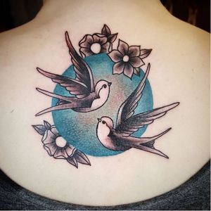 Swallows tattoo by Zoe Fraser #ZoeFraser #TheTattooedArms #swallows #flower #birds #traditional