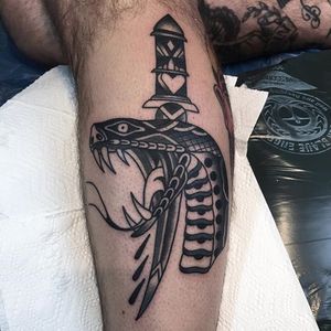 Snake and dagger. (via IG - wastedhappyyouth) #traditional #blacktraditional #blacktattoo #lucaswagner #snake #dagger