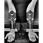 A killer set of matching forearm tattoos via Ben Volt (IG—benvolt). #BenVolt #blackwork #Bold #forearm #negativespace
