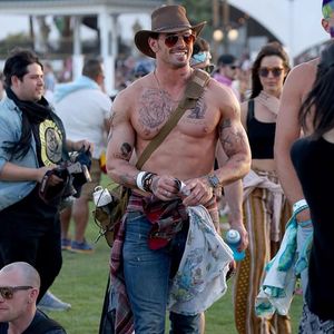 Twilight actor Kellan Lutz turned up to this year's Coachella rocking some ink, photo by Fern at Splash News #coachella #festival #tattoostyle #fashion #flashtattoo #temporarytattoo #hollywood #actor