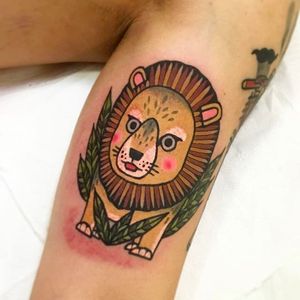 Super cute little lion tattoo. Really solid work by Ginger Jeong. #gingerjeong #lion #coloredtattoo #animaltattoo