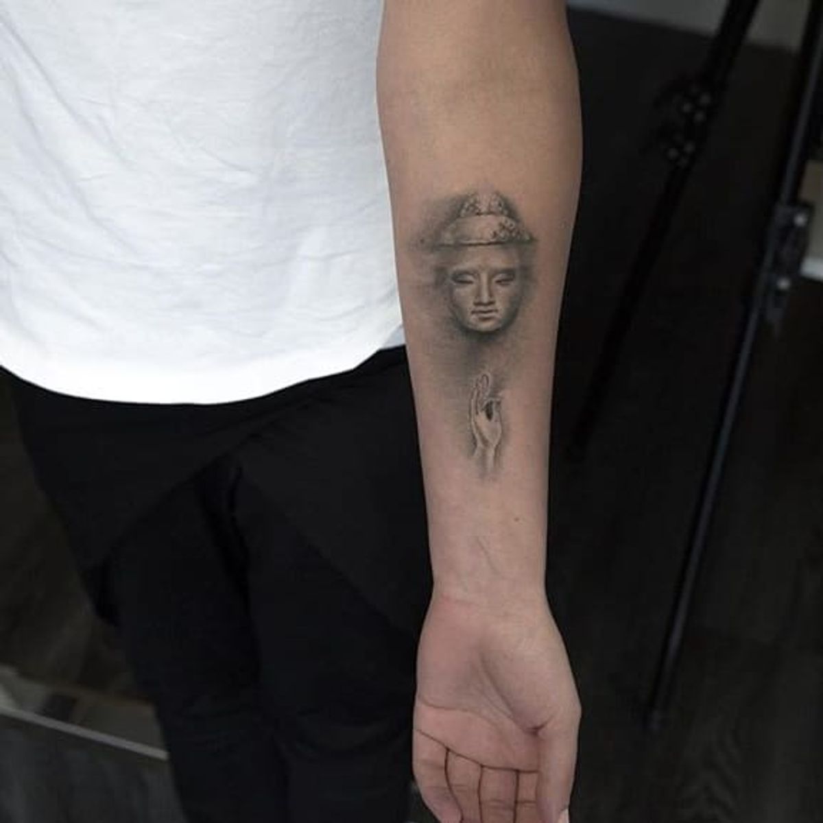 Tattoo uploaded by Ross Howerton • The delicacy of this Buddha by Niki  Norberg is suggetive of Nirvana. #bangers #blackandgrey #Buddha #minimalism  #NikiNorberg #photorealism #realism • Tattoodo