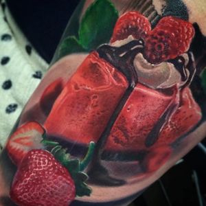 Strawberry cheesecake tattoo by Jesse Rix #JesseRix #desserttattoos #color #realistic #realism #hyperrealism #food #dessert #sweets #cheesecake #cake #strawberry #chocolate #whippedcream