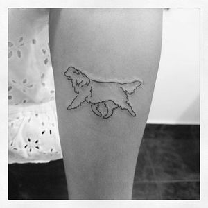 A simple linework Golden Retriever silhouette tattoo by Julio Mucci. #goldenretriever #dog #silhouette #linework #JulioMucci