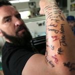 Nash midway through inscribing the 120 names on his arm. #armtattoo #motivationalspeaker #musician #names #RobbNash #suicideawareness