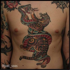 Battle Royal tattoo by Joel Soos #tigertattoo #snaketattoo #JoelSoos #traditionaltattoo