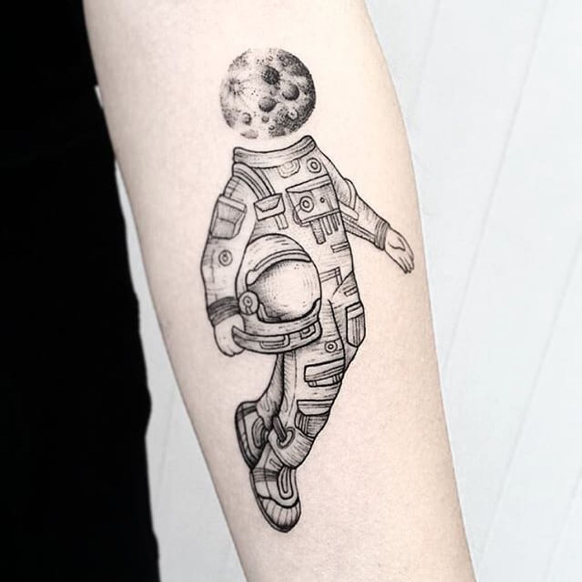simple astronaut tattoo