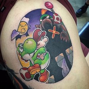 Super Mario World tattoo by Carly Baggins. #CarlyBaggins #supermario #videogame