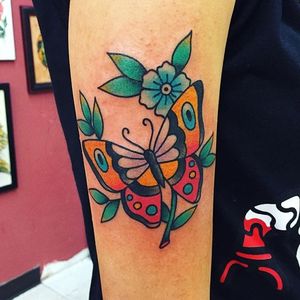 Traditional butterfly and flowers piece by Randy Conner. #traditional #RandyConner #tattooflash #flashtattoo #flowers #butterfly