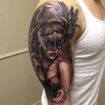 Spectacular black & gray tattoo of a sophisticated masked lady by unknown artist. Please let us know if you do! #blackandgrey #maskedlady #masquerade
