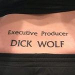The infamous "Executive Producer Dick Wolf" tramp stamp. #DickWolf #LawandOrder #trampstamp