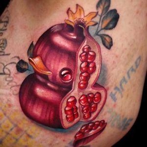 Pomegranate rubber ducky tattoo by Steven Compton. #newschool #rubberduck #StevenCompton #rubberducky #fruit #pomegranate