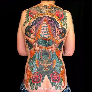 A wonderfully vibrant maritime back-piece featuring a clipper, mermaids, and Nepture via Valerie Vargas (IG—valeriemodernclassic). #clipper #color #eagle #mermaids #Nepture #roses #traditional #ValerVargas