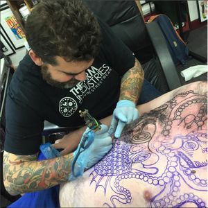 Deno working on a massive tattoo for one of his clients. #Deno #streetart #surreal #traditional #trippy #whale