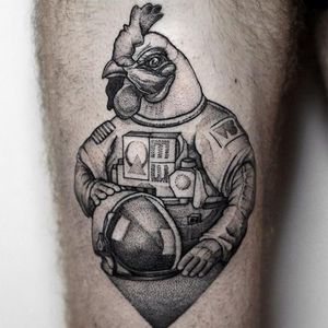 A cock in a cosmonaut suit... Indeed. By Bartek Wojda.