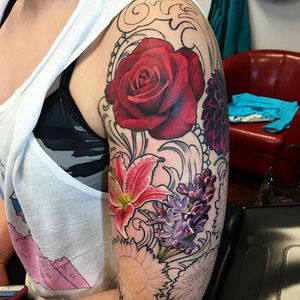 @laura_craver #ladytattooers #realism #color redrose #orchid