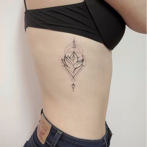 Graphic flower tattoo by @alisovatattoo #AlisaAlisova #linework #blackwork #dotwork #moon #lotus #lotusflower