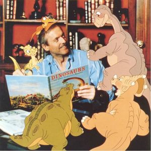 An awesome photo of Don Bluth with characters from The Land Before Time superimposed on and around him. #animation #childrensmovies #DonBluth #TheLandBeforeTime