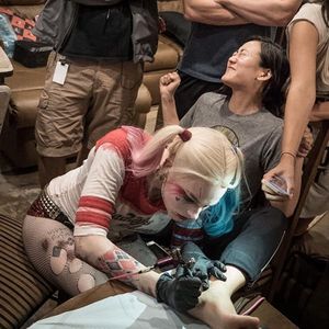 Margot Robie tattooing her co-star on the foot. #CelebrityTattoos #CastTattoo #MovieTattoo #SuicideSquad