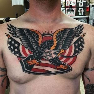 Jacob Doney bold take on the classic bald eagle and banners (IG—jacobdoneytattoo). #AmericanFlag #baldeagle #JacobDoney #patriotic #traditional
