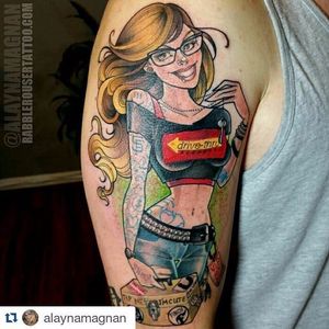 Merch girl pin-up tattoo by Alayna Magnan. #pinup #neotraditional #AlaynaMagnan #merchgirl