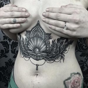 Shell tattoo by Laura Weller. #shell #mermaid #sea #ocean #seashells #pearl #blackandgrey #underboob