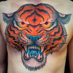 Massive tiger head chest tattoo done by Graham Beech. #GrahamBeech #NeoTraditional #AnimalTattoos #tiger #chesttattoo