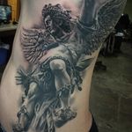 An amazing large-scale tattoo of an angel by Jhon Gutti (IG—jhongutti). #angel #blackandgrey #JhonGutti #realism #statuesque