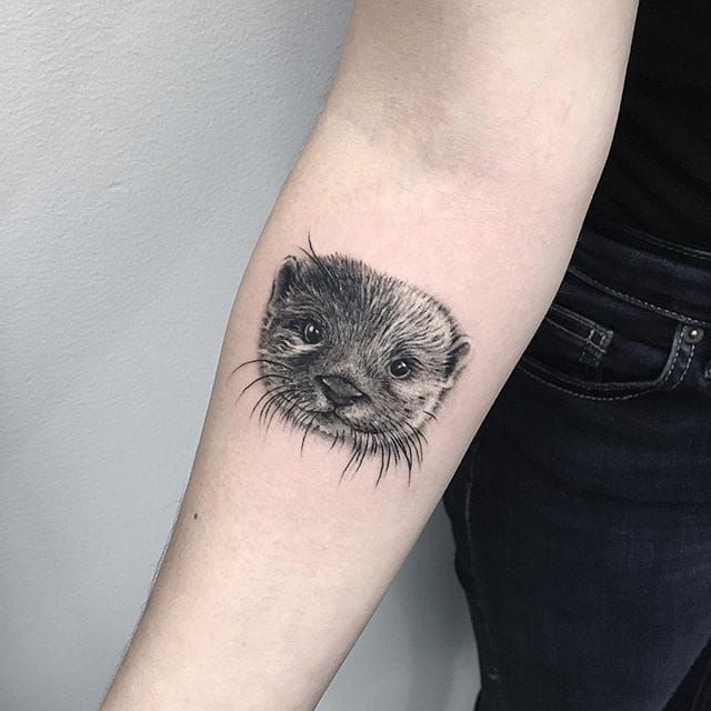Microrealistic otter portrait tattoo done on the inner