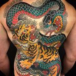 Snake vs tiger by Kiku #Kiku #kikupunk #color #Japanese #traditional #mashup #tiger #snake #clouds #leaves #animal #wildlife #junglecat #cobra #scales #stripes #fight #nature #backpiece #tattoooftheday