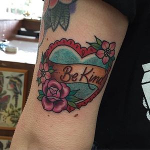 Your daily reminder to be kind. Tattoo by Sami Locke. #neotraditional #heart #flowers #lettering #banner #bekind #SamiLocke