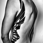 A wing-like piece along the ribs of one of Ben Volt's clients (IG—benvolt). #abstract #avantgarde #BenVolt #bold #blackwork #experimental #geometric #minimalist #ornamental