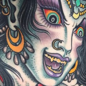 Closeup shot of one of Valerie Vargas' (IG—valeriemodernclassic) best sorceress tattoos in color.  #color #sorceress #traditional #ValerVargas