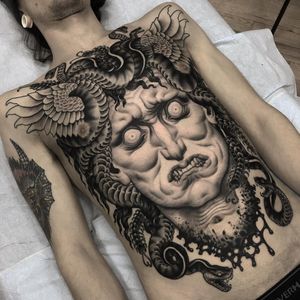 Medusa tattoo by Matt Buck #MattBuck #portraittattoos #blackandgrey #neotraditional #realism #portrait #Medusa #greek #mythology #deity #goddess #snakes #reptile #feathers #wings #severedhead
