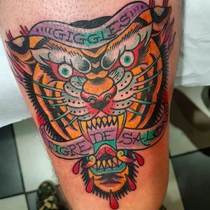 Awesome and classic looking tiger head tattoo by Eddie Czaicki. #eddieczaicki #tiger #tigerhead #traditionaltattoo #coloredtattoo