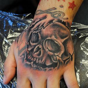 Skull tattoo by Logan #ozonetattoo #blackandgrey #skull #handtattoo 