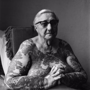 #old tattooed woman