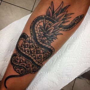 Tattoo done by Jim Little here at Deluxe Tattoo. #deluxetattoo #deluxetattoochicago #blackandgreytattoo #blackandgrey #pineapple #snake